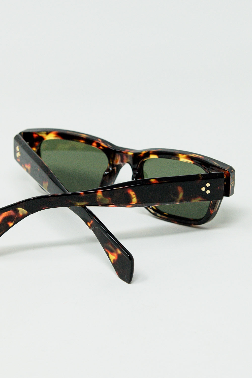 Amber sunglasses with dark green oval lenses | Just Cool Beans