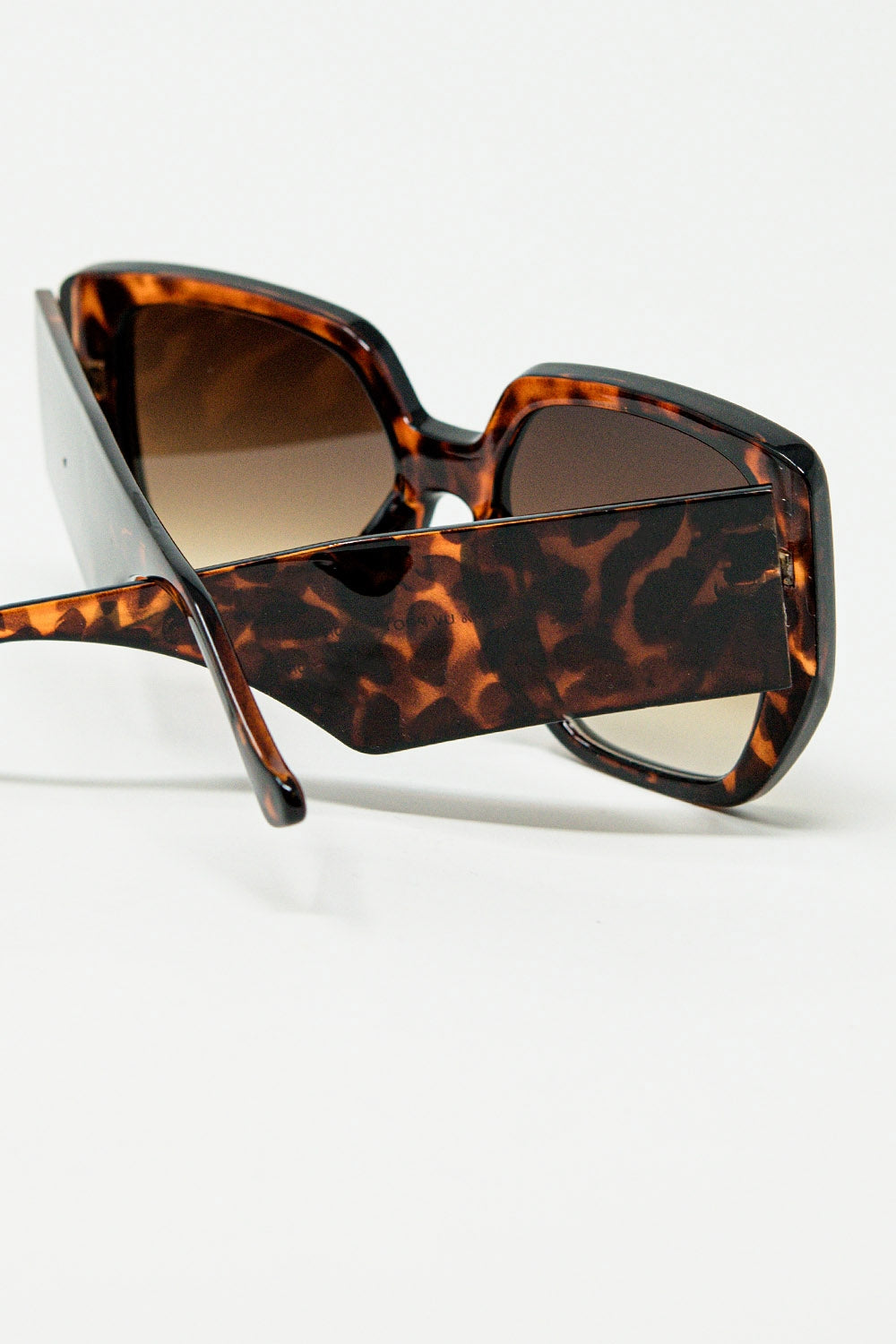 Brown pin-up style sunglasses with geometric design and cat eyes | Just Cool Beans