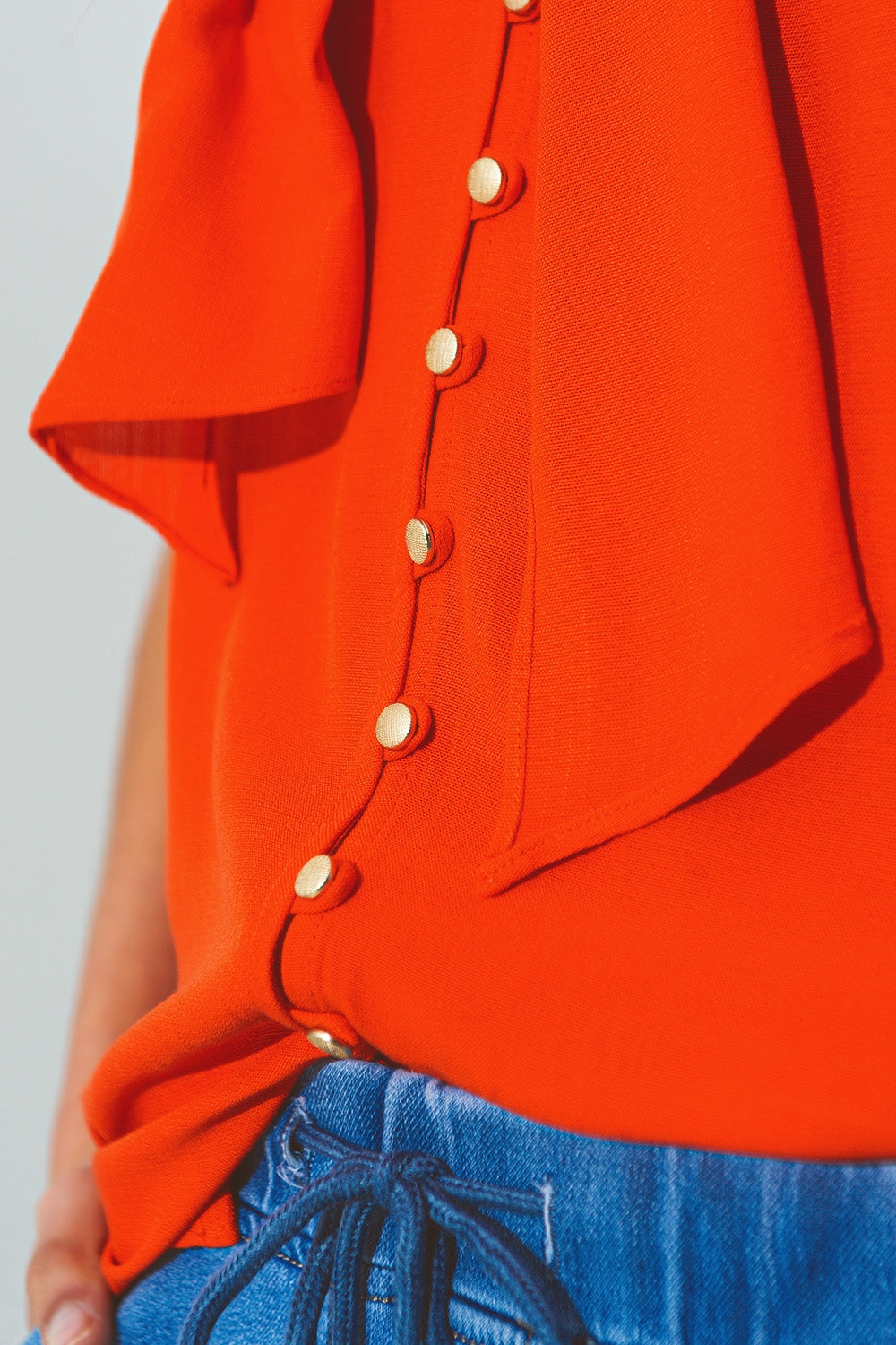 Halter neck top with button details in orange | Just Cool Beans