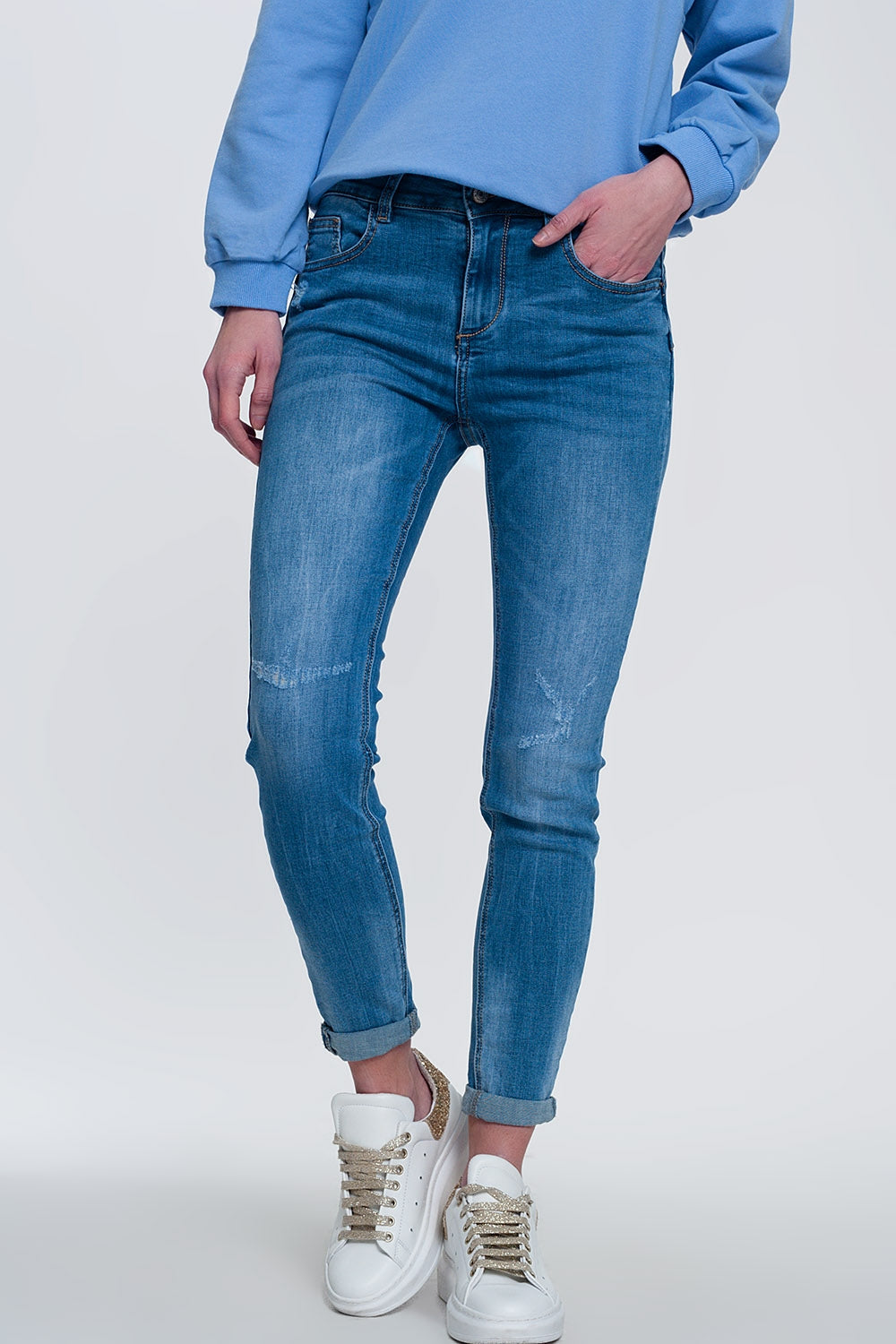 Light denim skinny jeans with folded ankles and ripped detail | Just Cool Beans — jeans | the denim shop