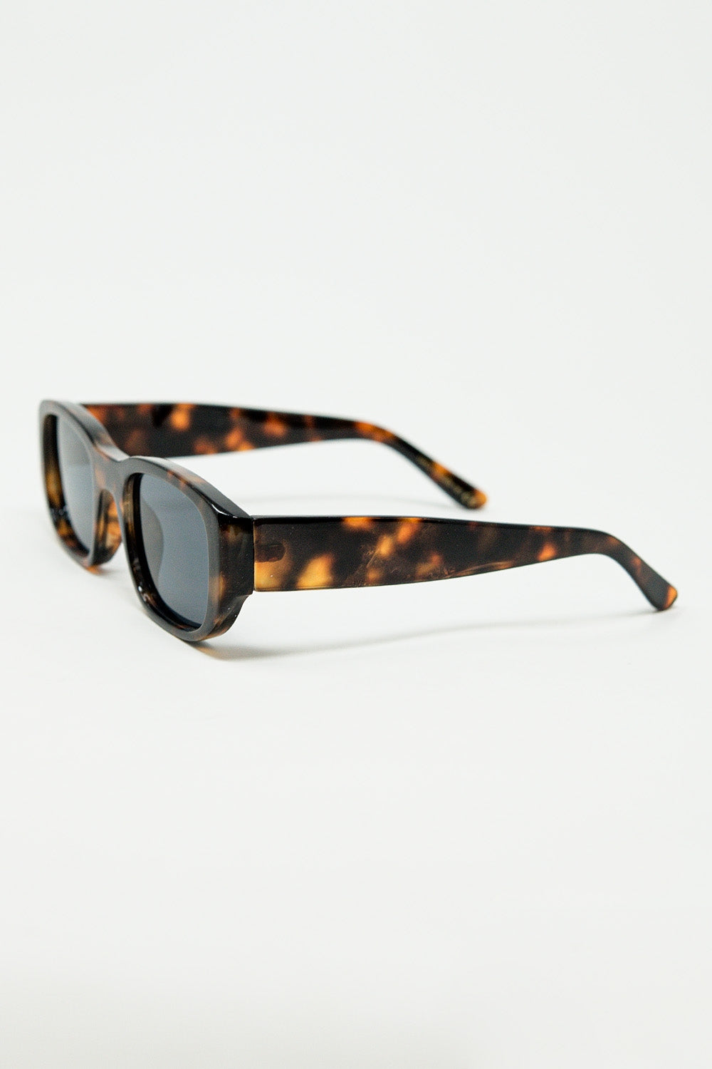 Oval sunglasses with high gloss transparent frames in brown | Just Cool Beans