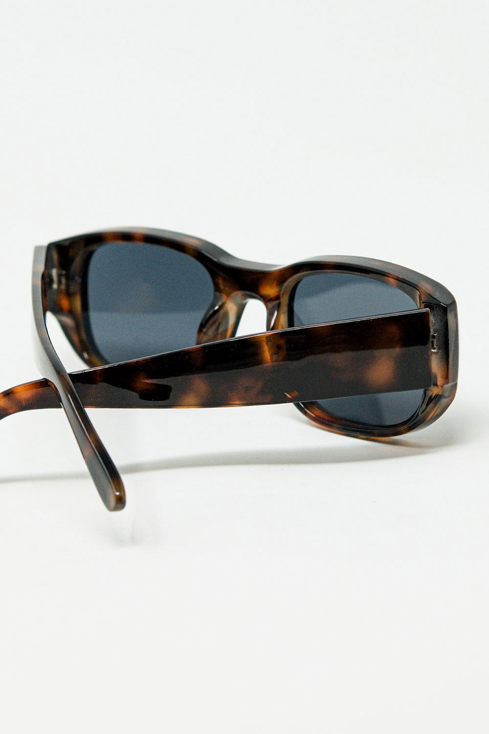Oval sunglasses with high gloss transparent frames in brown | Just Cool Beans