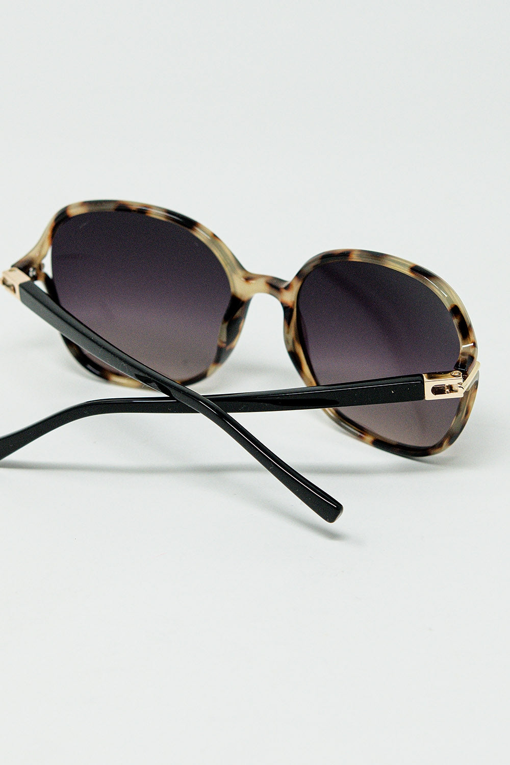 Round beige printed sunglasses with gold metal detail | Just Cool Beans
