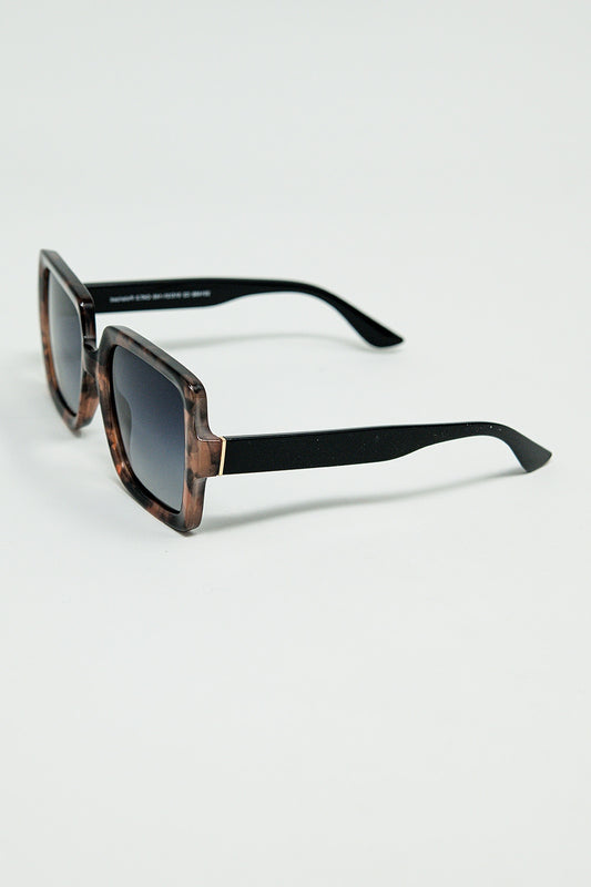 Sunglasses with a brown print frame and black temples | Just Cool Beans
