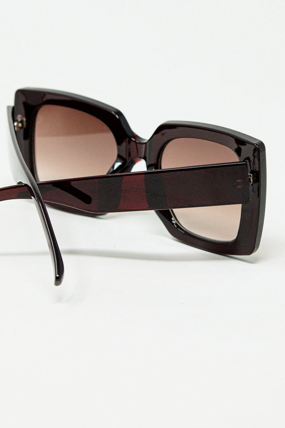 Vintage silhouette sunglasses with a subtle angled cat-eye in burgundy | Just Cool Beans