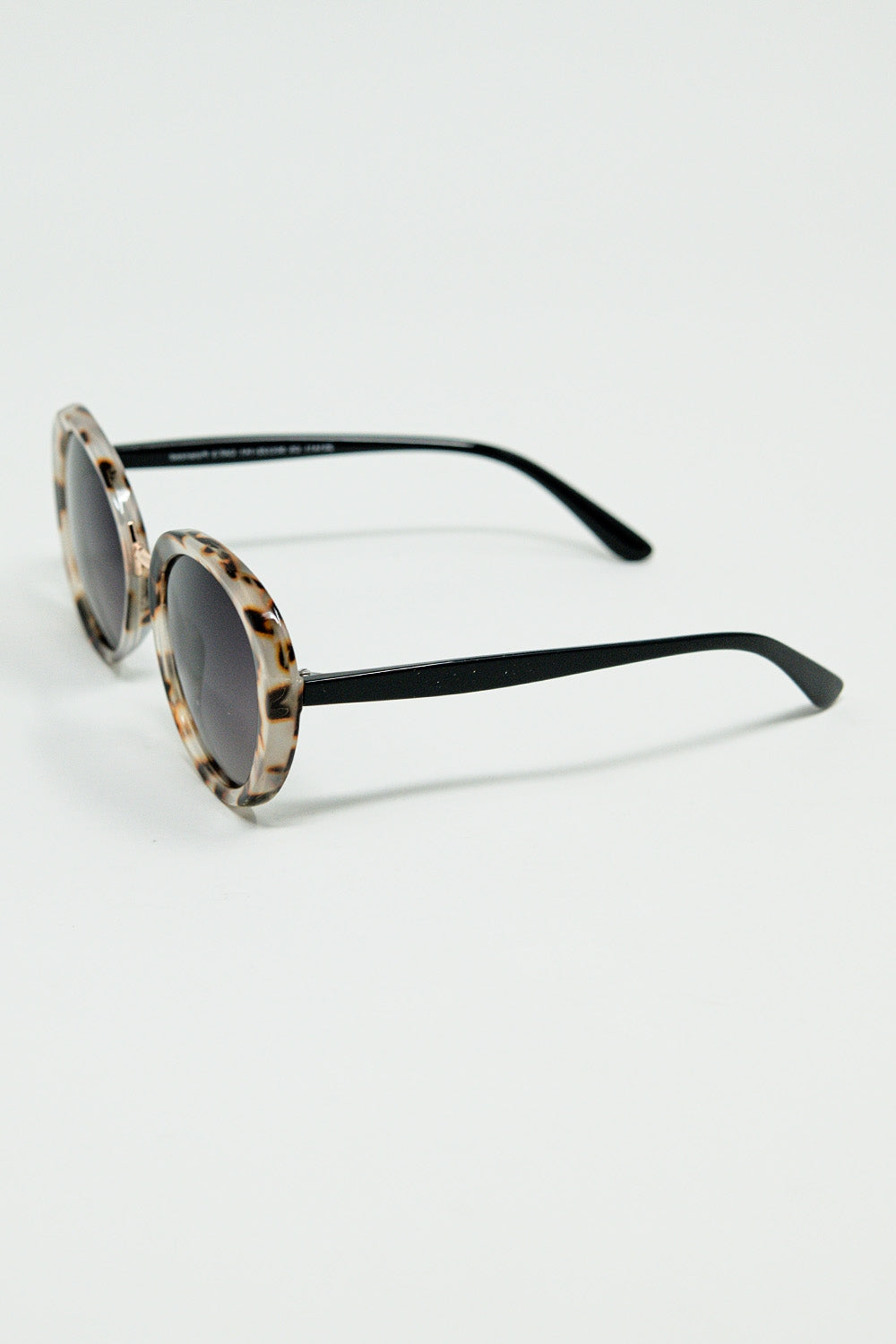 Beige sunset spot oval shaped sunglasses | Just Cool Beans
