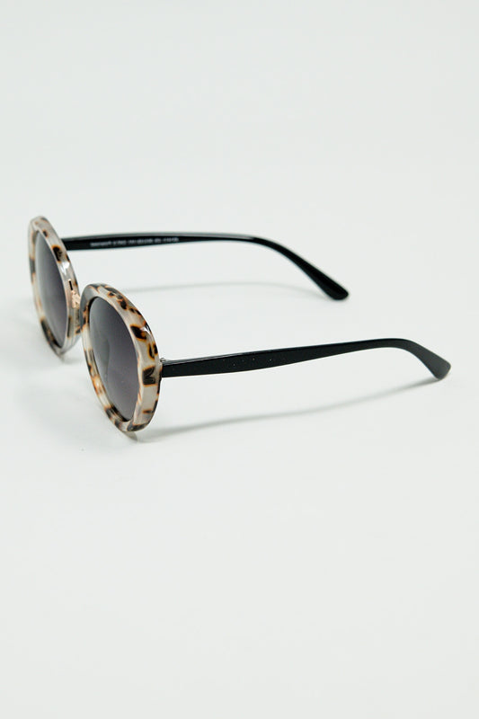 Beige sunset spot oval shaped sunglasses | Just Cool Beans