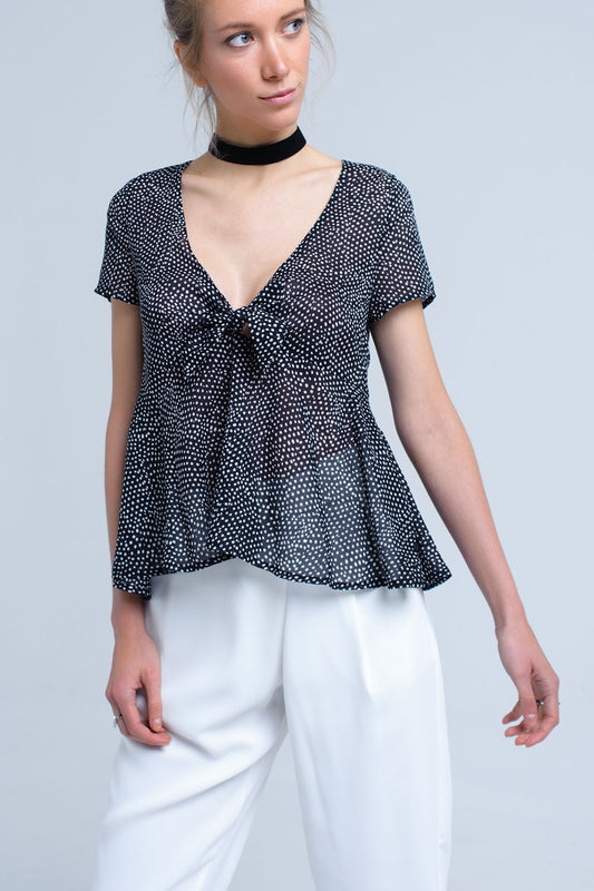 Black polka dot top with ruffle hem | Just Cool Beans — shirts | tops