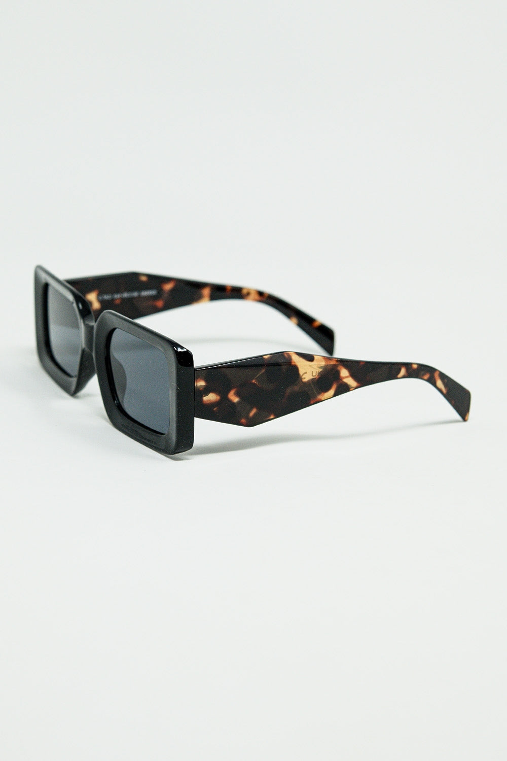 Black square sunglasses with brown animal print on the side | Just Cool Beans