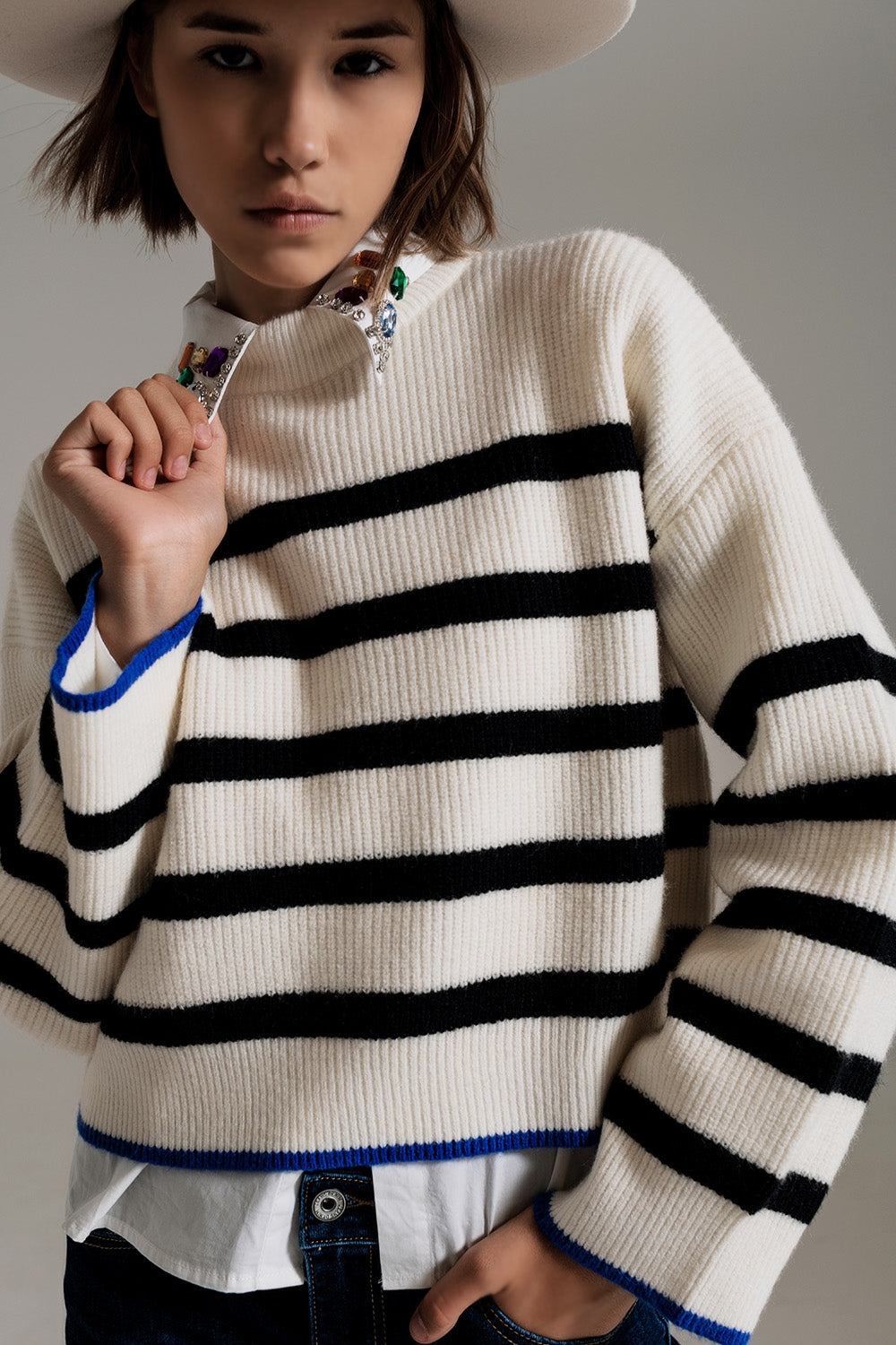 Black striped jumper with blue stripe detail on the bottom | Just Cool Beans — sweaters | tops
