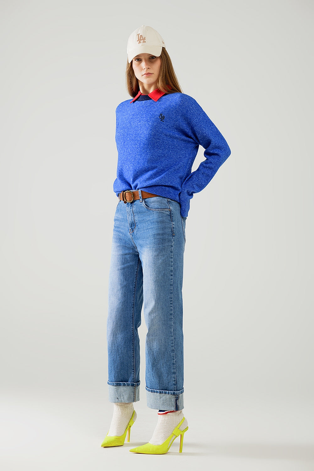 Blue sweater with contrasting collar and love logo on chest