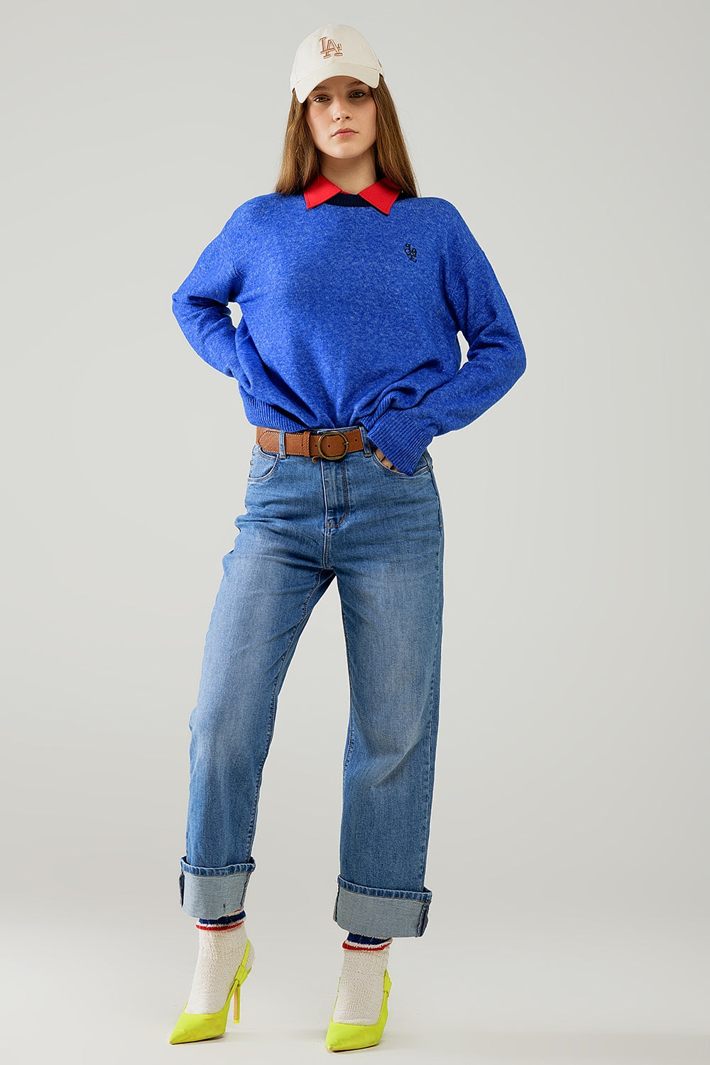 Blue sweater with contrasting collar and love logo on chest