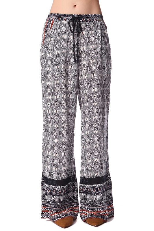 Blue pants in ethno print with wide leg and eyelash lace insert | Just Cool Beans — pants | bottoms