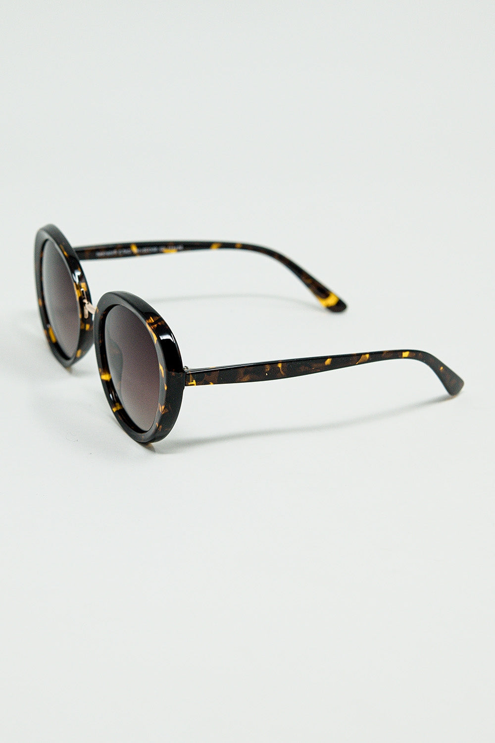 Brown sunset spot oval shaped sunglasses | Just Cool Beans