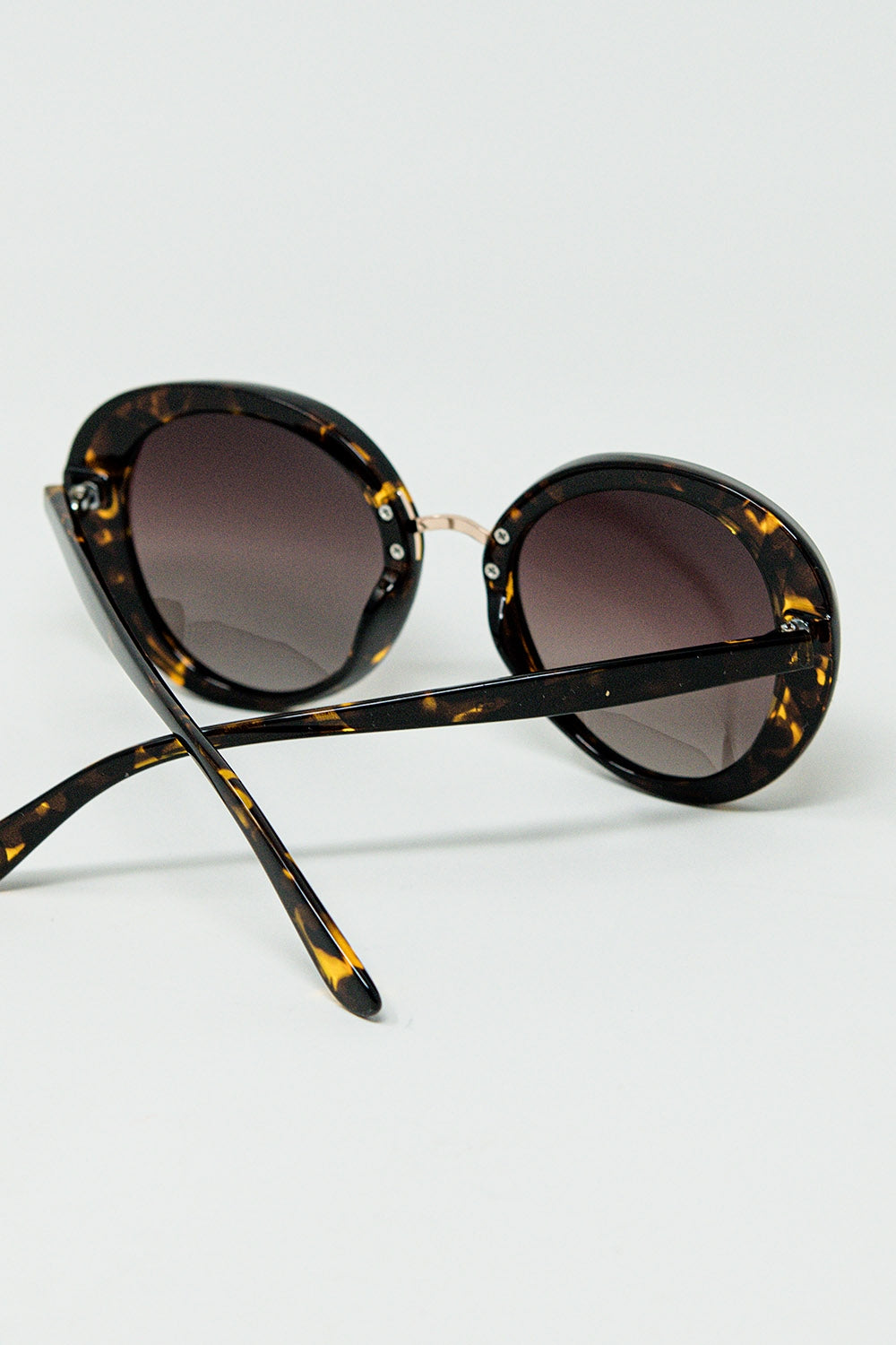 Brown sunset spot oval shaped sunglasses | Just Cool Beans