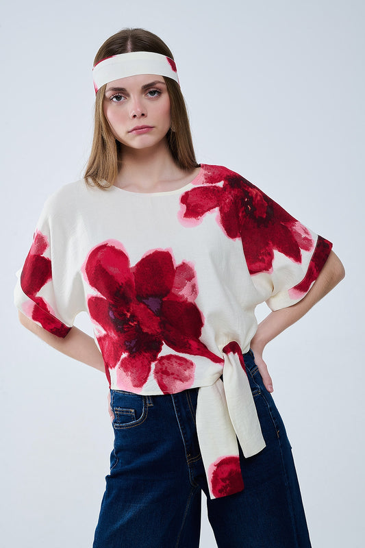 Cropped beige blouse with tropical floral print in red tied at the waist | Just Cool Beans — tops
