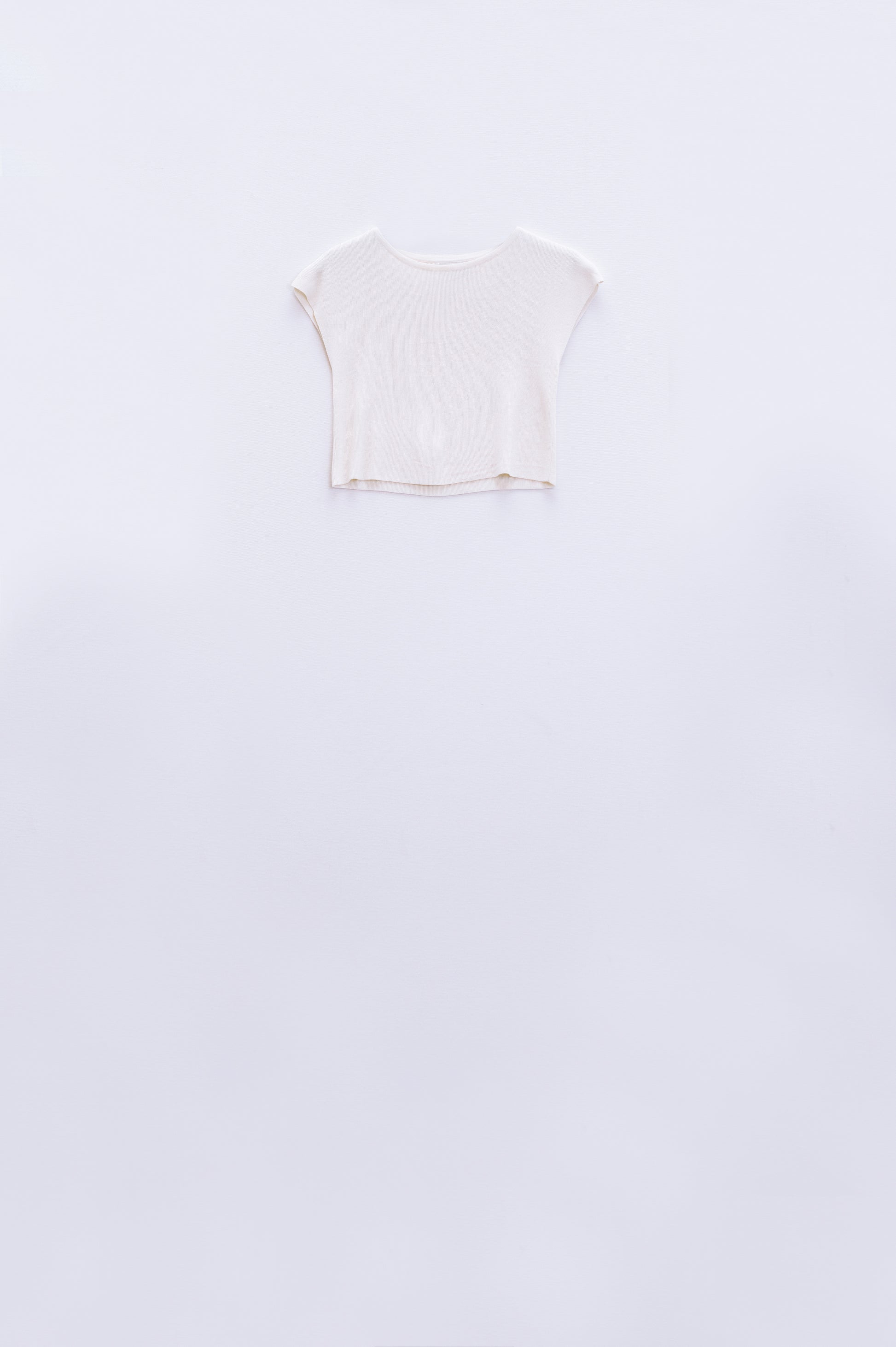 Cropped knitted short sleeves t-shirt in white | Just Cool Beans — sweaters | bottoms