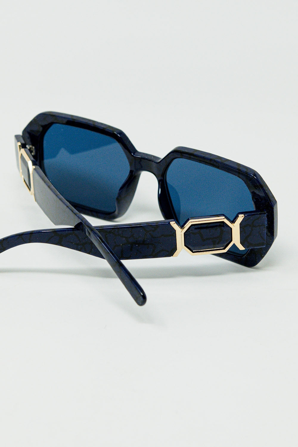 Diamond-shaped sunglasses in black with deep blue lenses | Just Cool Beans