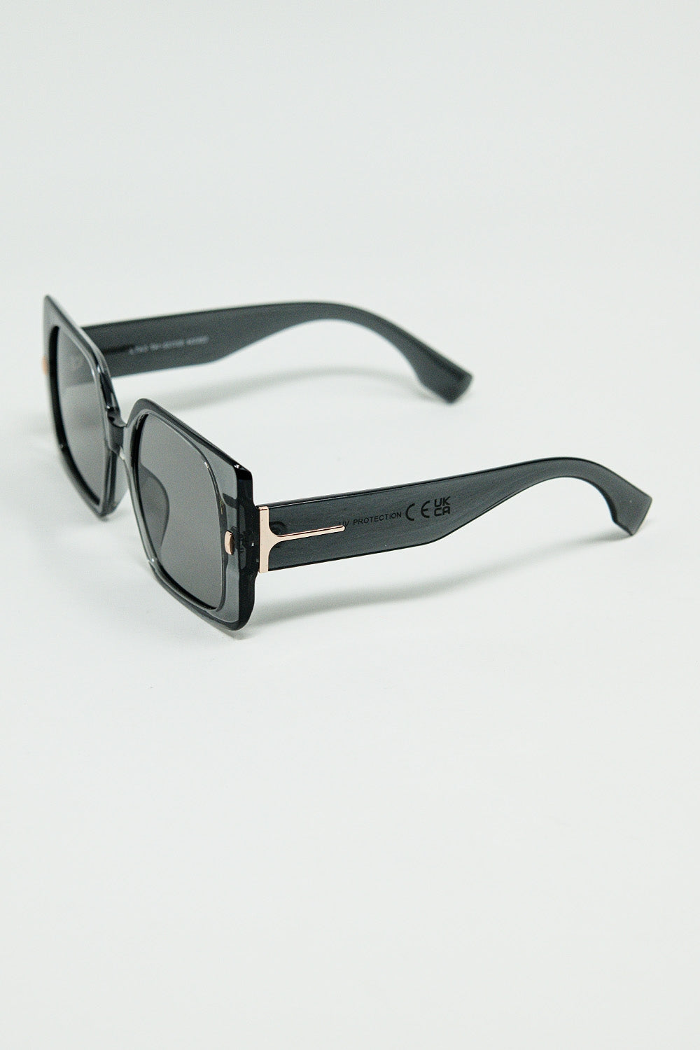Grey square sunglasses with gold detail on the side | Just Cool Beans