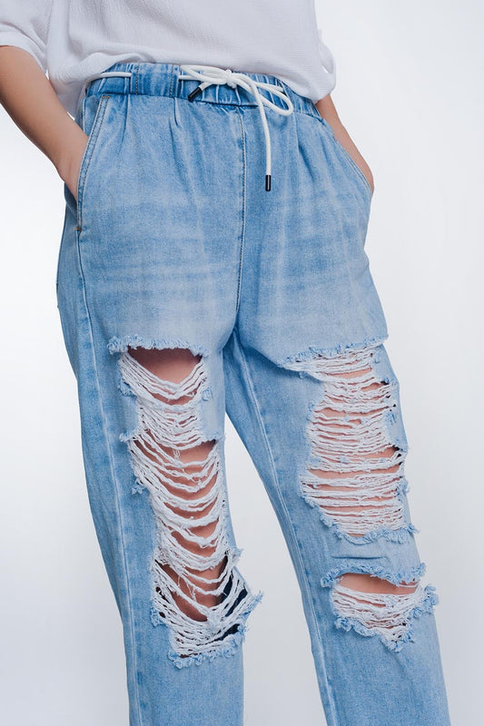 Heavily ripped boyfriend jeans in light denim | Just Cool Beans