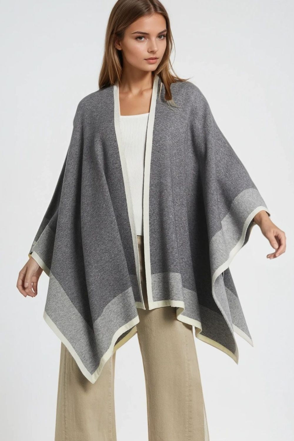 Knitted poncho in grey with ecru trim | Just Cool Beans — sweaters | tops
