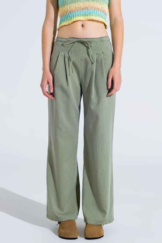 Light green relaxed pants with drawstring closing and side pockets | Just Cool Beans — pants | bottoms