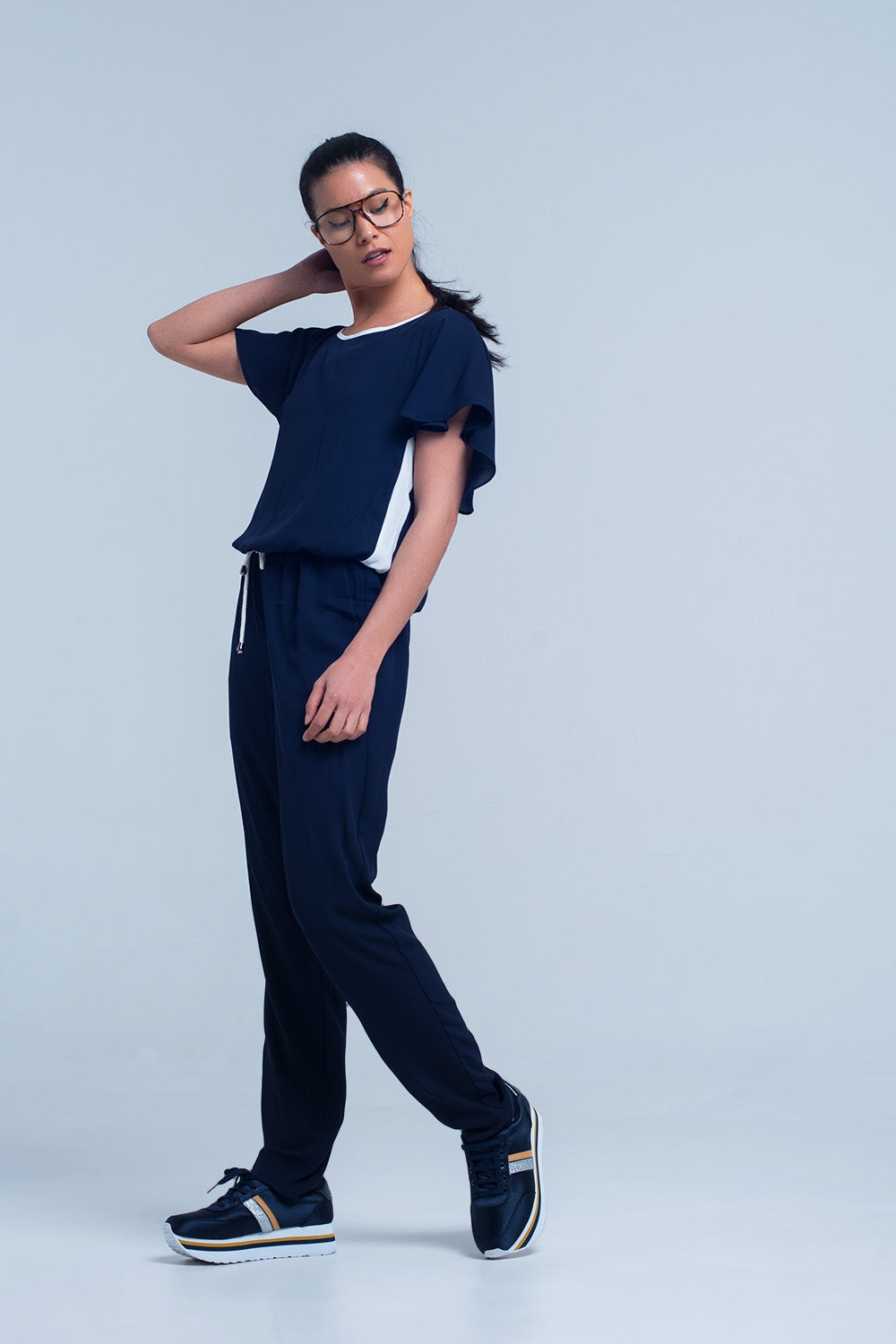 Navy blue jumpsuit with short sleeve and ruffle detail | Just Cool Beans — dresses | bottoms