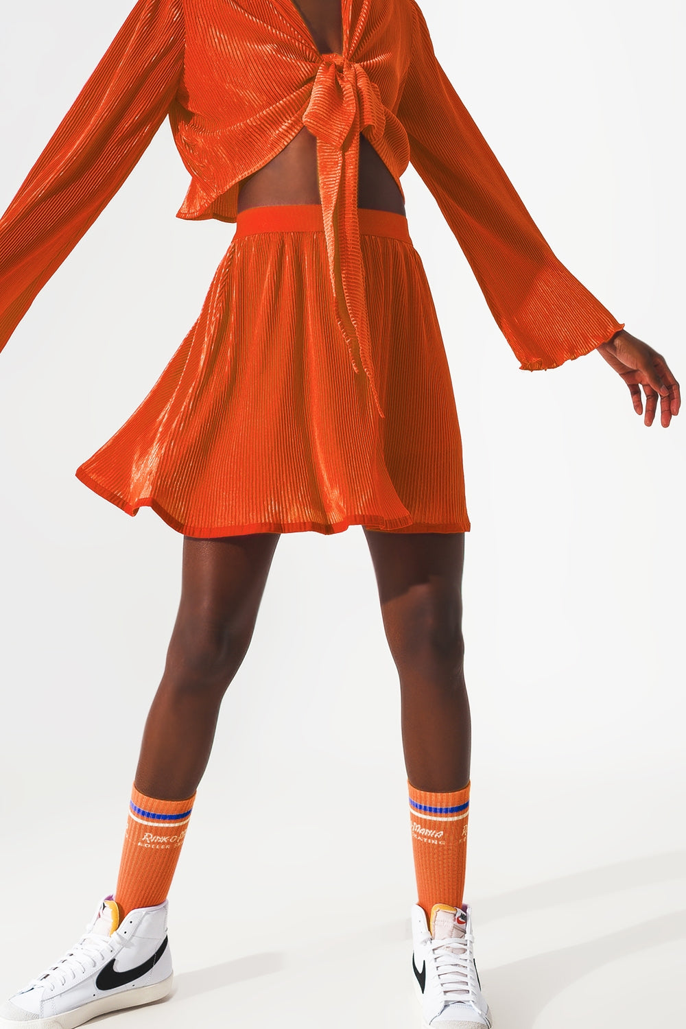 Pleated short skirt in orange | Just Cool Beans — skirts | bottoms