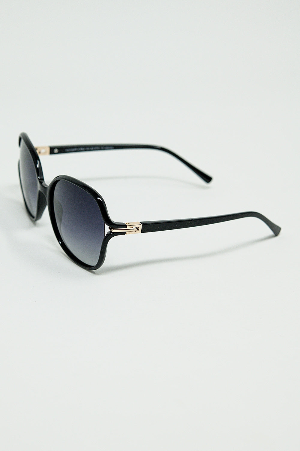 Round sunglasses in black with gold metal detail | Just Cool Beans