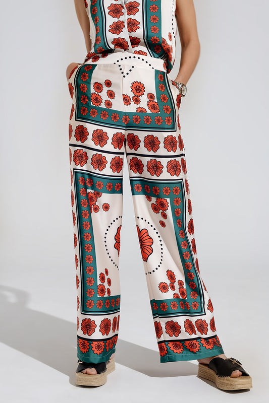 Satin creme flared pants with floral design | Just Cool Beans — pants | bottoms