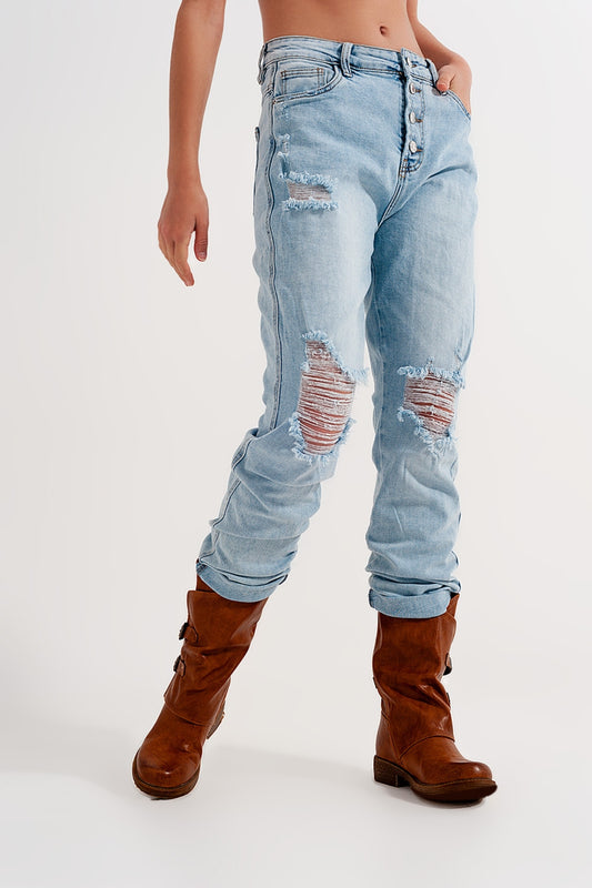 Straight leg distressed jeans with button detail in light blue | Just Cool Beans