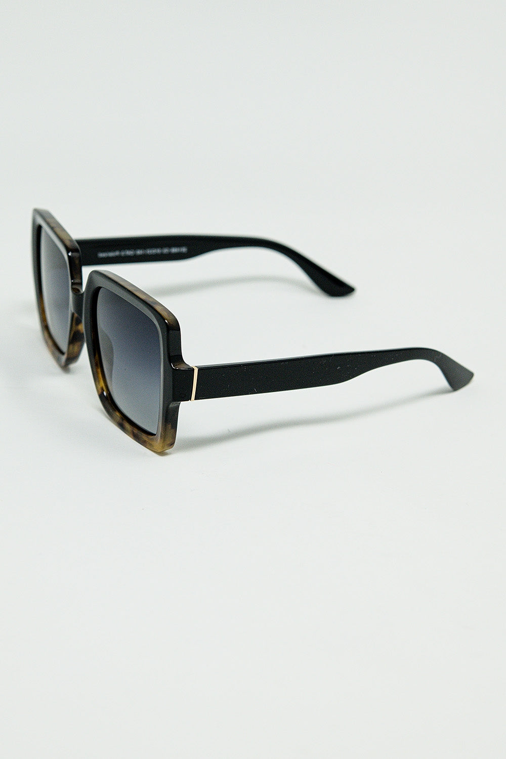Sunglasses with a gradient print frame and black temples | Just Cool Beans