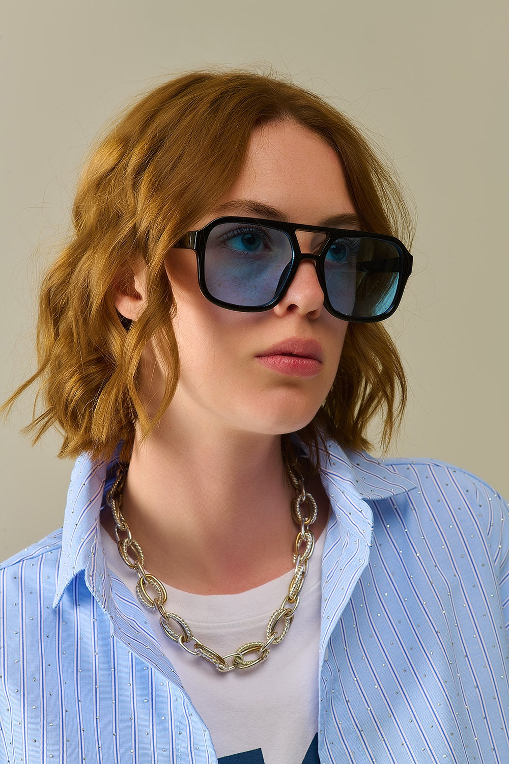 Sunglasses with black frames and blue lenses | Just Cool Beans