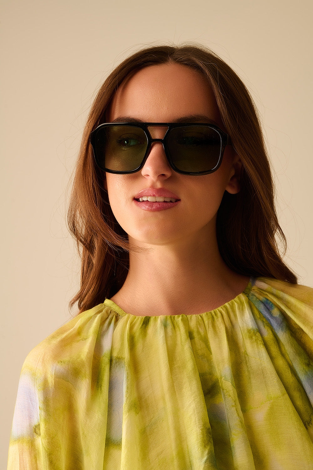 Sunglasses with black frames and green lenses | Just Cool Beans