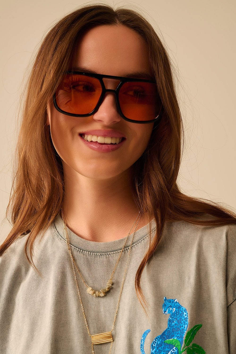 Sunglasses with black frames and orange lenses | Just Cool Beans