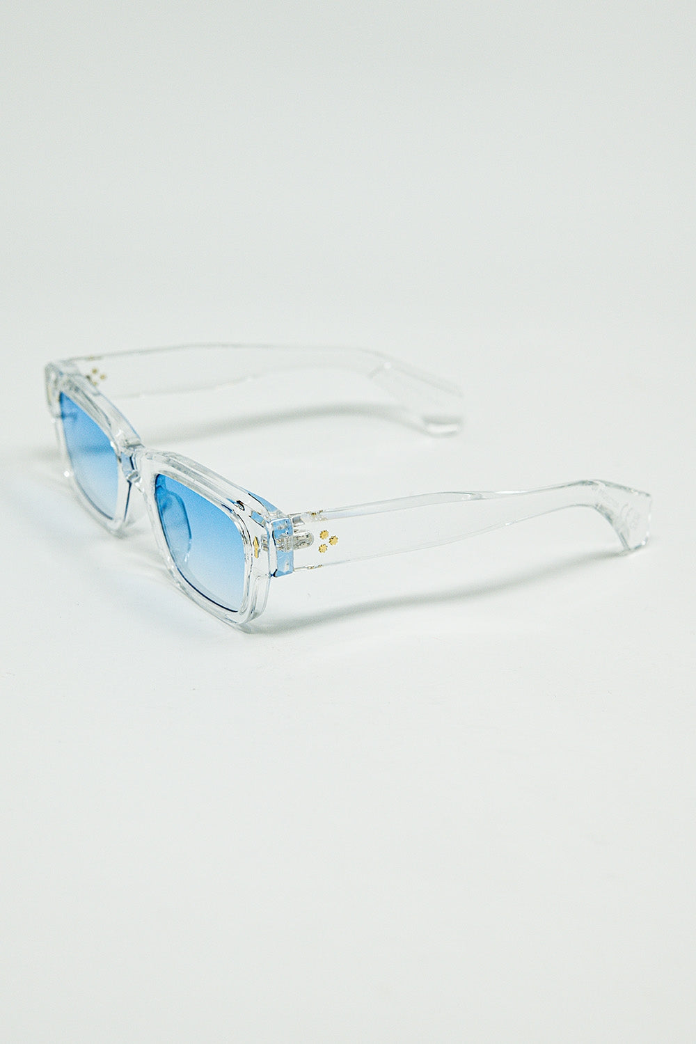Translucent white sunglasses with oval light blue lenses | Just Cool Beans