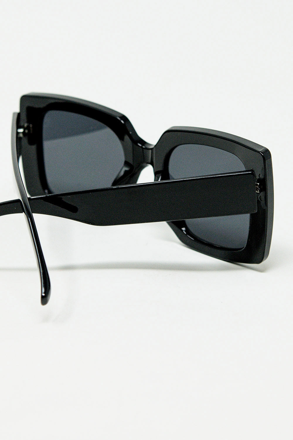 Vintage silhouette sunglasses with a subtle angled cat-eye in black | Just Cool Beans