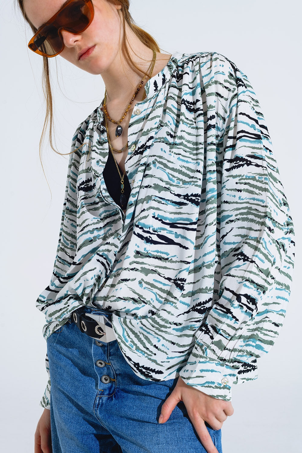 White blouse with green animal print and long sleeves | Just Cool Beans — shirts | tops